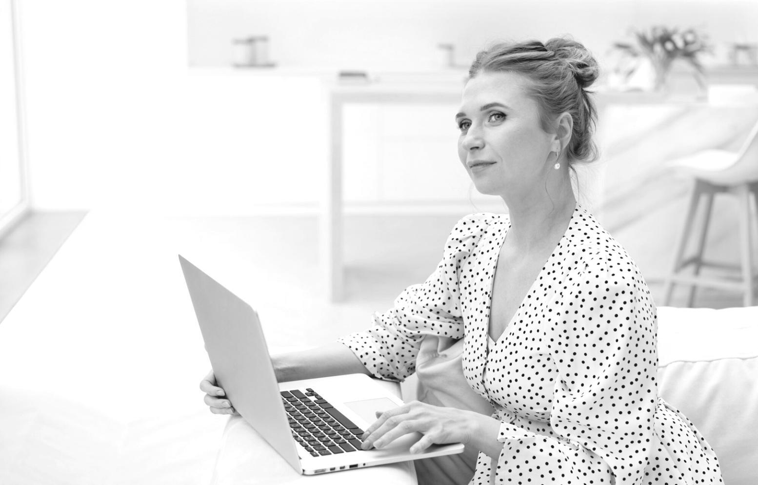 Business professional reviewing financial charts and presentation materials